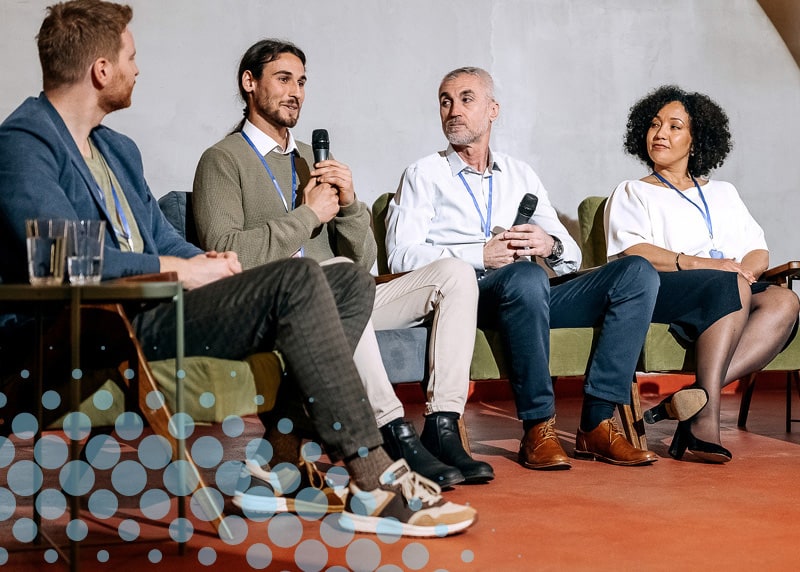 people on stage at a debate
