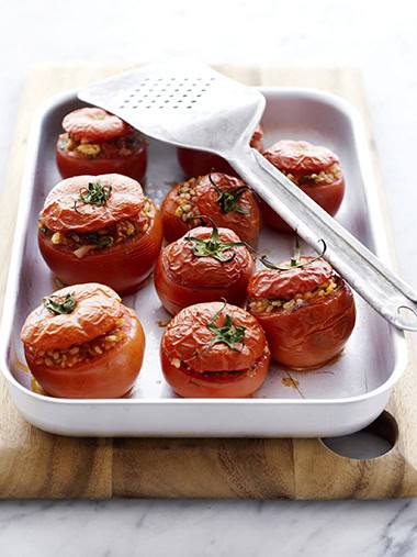 Greek-style rice and feta stuffed tomatoes