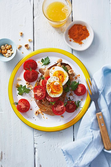 Hazelnut butter and tomatoes on sourdough