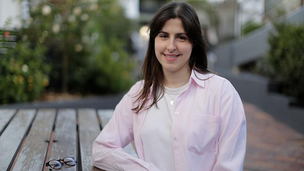 Holly sitting outdoors
