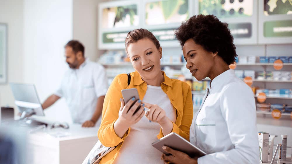 Woman asking for assistance in pharmacy