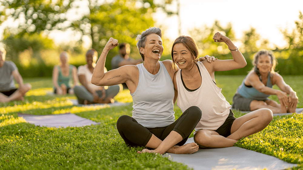 Women doing yoga outside